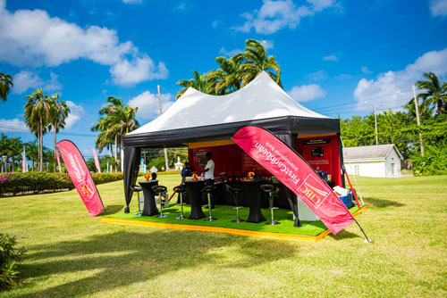 First Caribbean International Bank Booth with swivel bar stools and bar tables