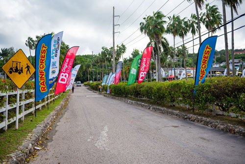 Road with sponsor flags lining both sides