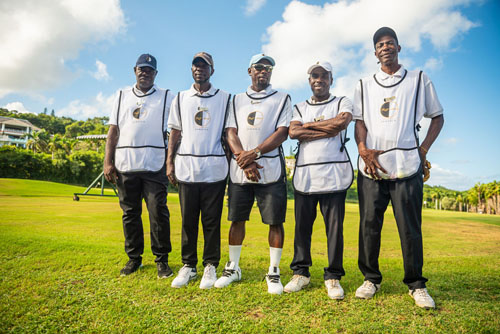 Five men in Half Moon uniforms on the golf course