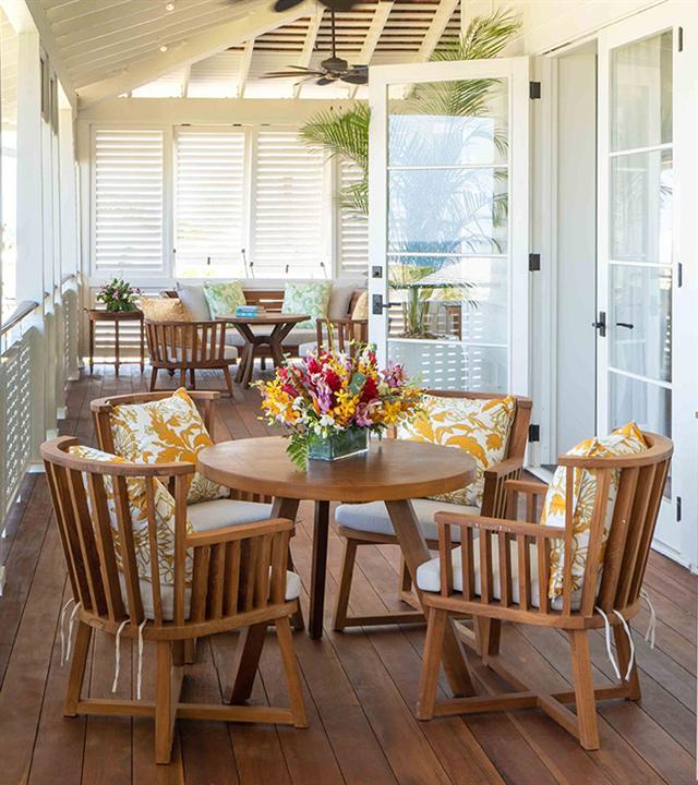 A patio with a table and chairs