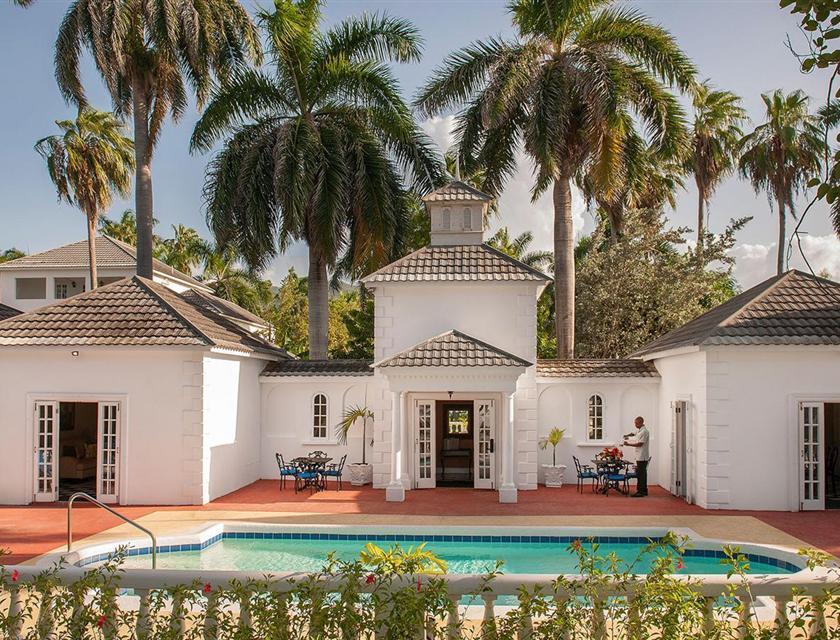 A pool in front of a house