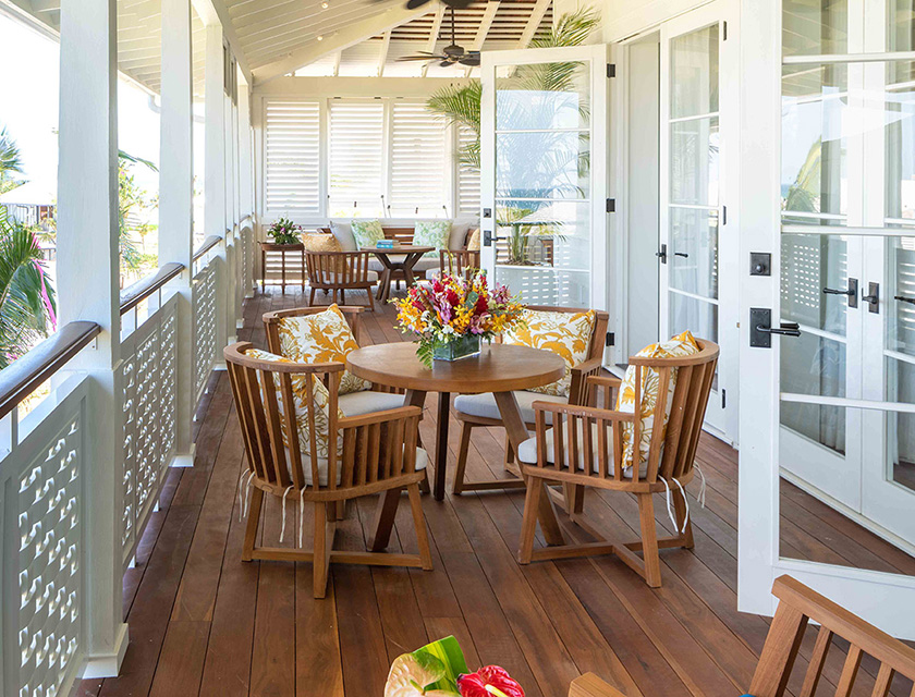 A patio with a table and chairs