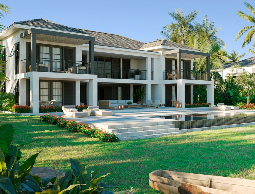 Villa backyard with green grass