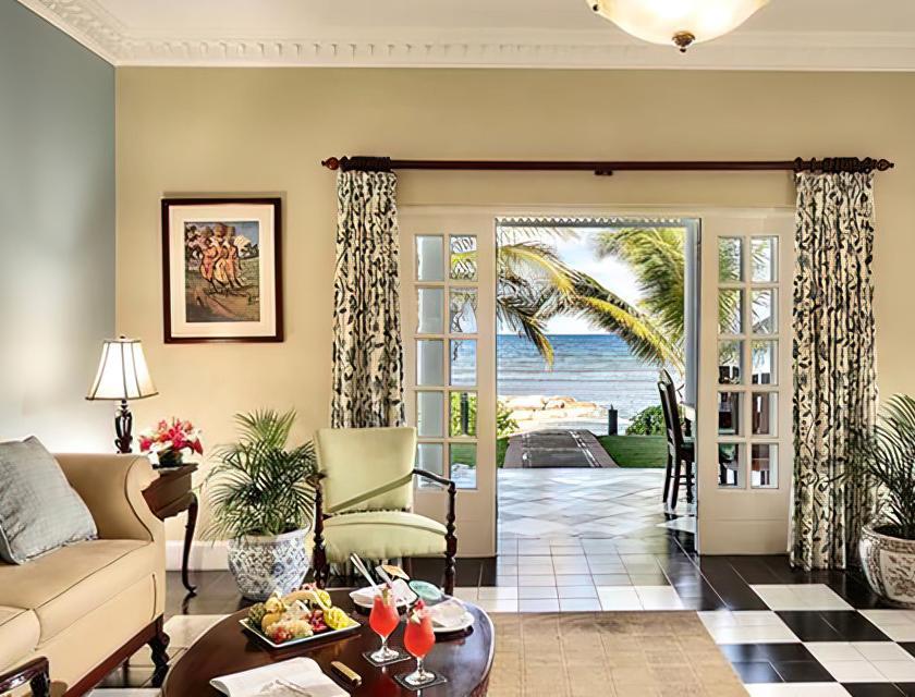 A living room with a view of the ocean