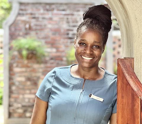 A woman smiling at camera